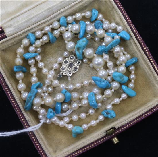 A cultured pearl and turquoise necklace with rose cut diamond set 9ct white gold clasp, 64cm.